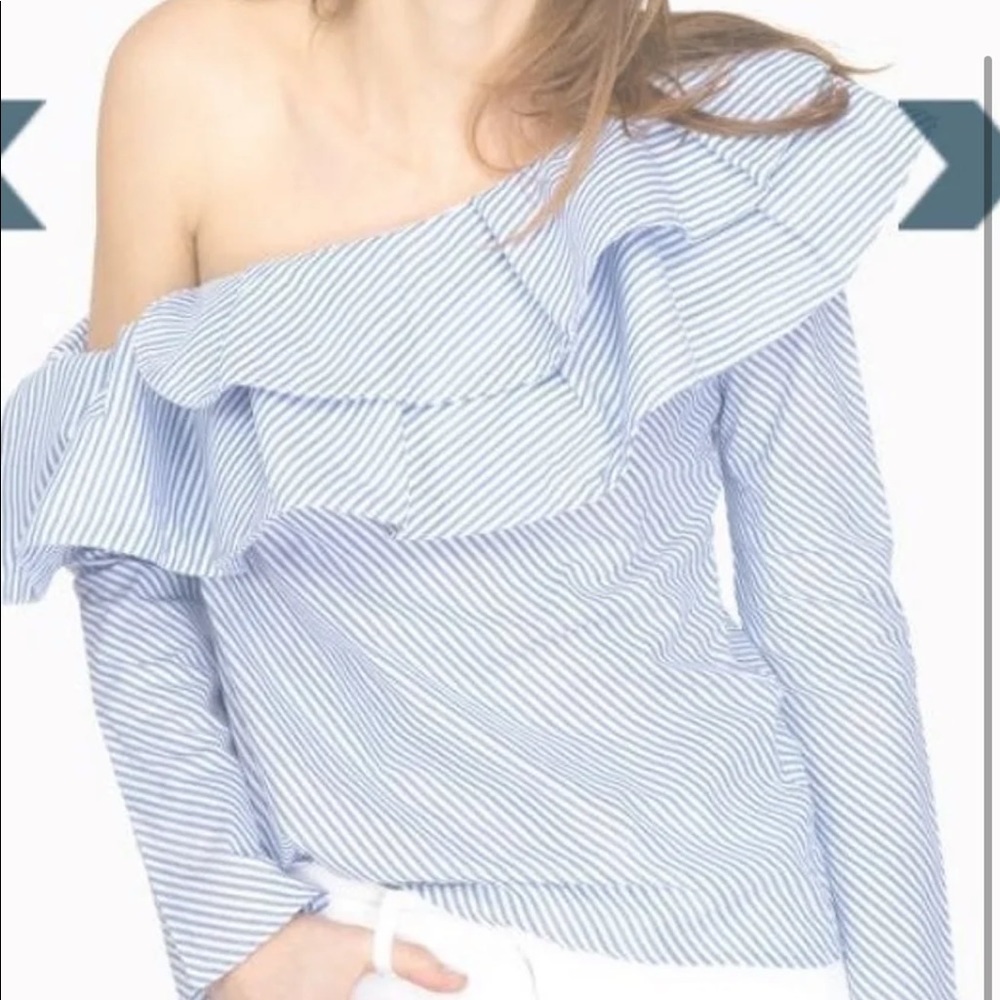 Dramatic, one shoulder ruffle top. Perfect for spring and summer.